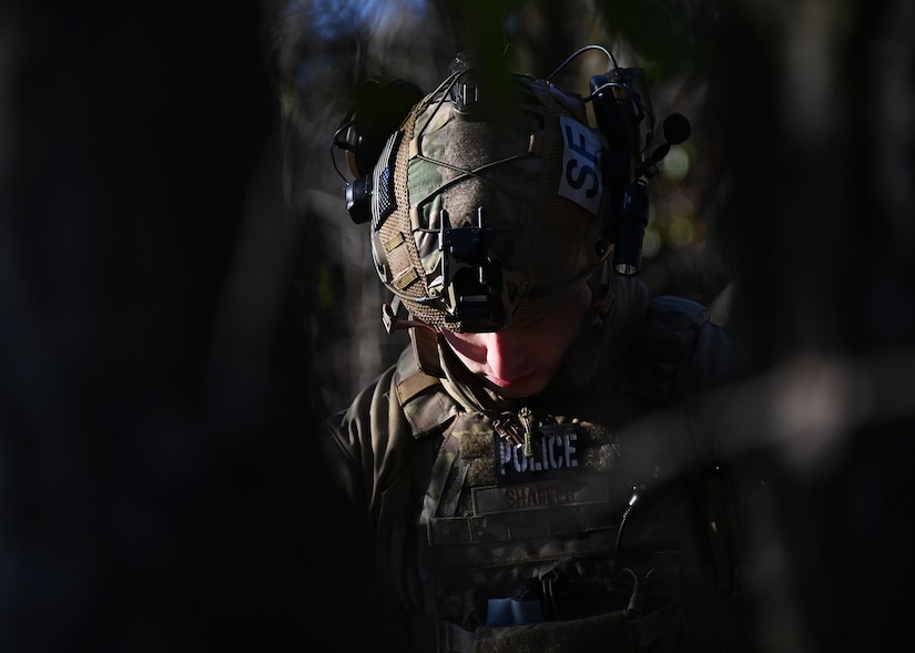 A 316th Security Forces Group Airman waits for Tactical Combat Casualty Care training to begin at Joint Base Andrews, Md., Nov. 18, 2022. The training consisted of 316th SFG,  316th Operations Group and 316th Medical Group Airmen practicing emergency care and evacuation by helicopter to reduce preventable deaths. (U.S. Air Force photo by Airman 1st Class Austin Pate)