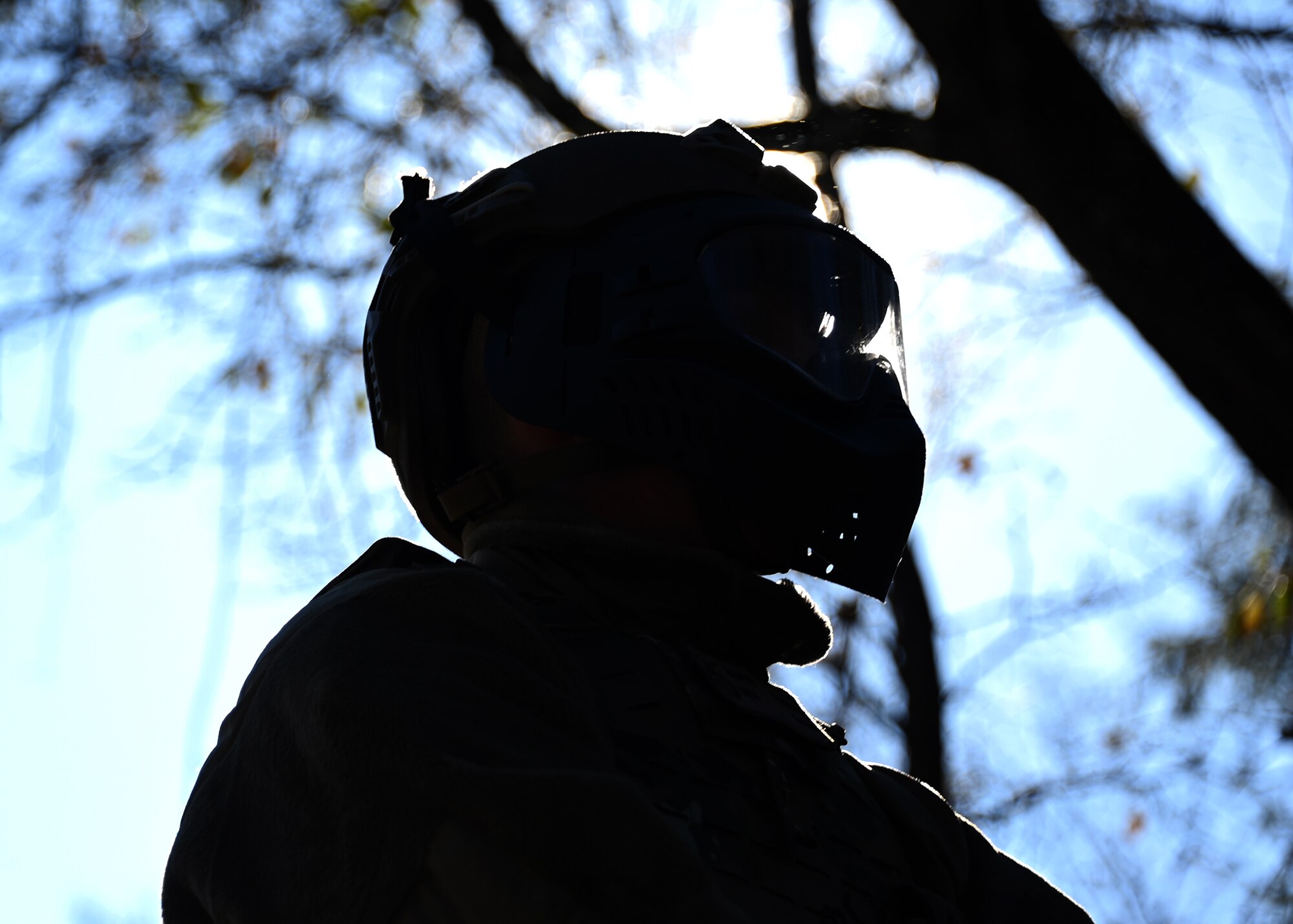 An Airman waits for Tactical Combat Casualty Care training to begin at Joint Base Andrews, Md., Nov. 18, 2022. The TCCC training consisted of moving towards injured victims, then performing proper emergency care methods and evacuation by helicopter. (U.S. Air Force photo by Airman 1st Class Austin Pate)