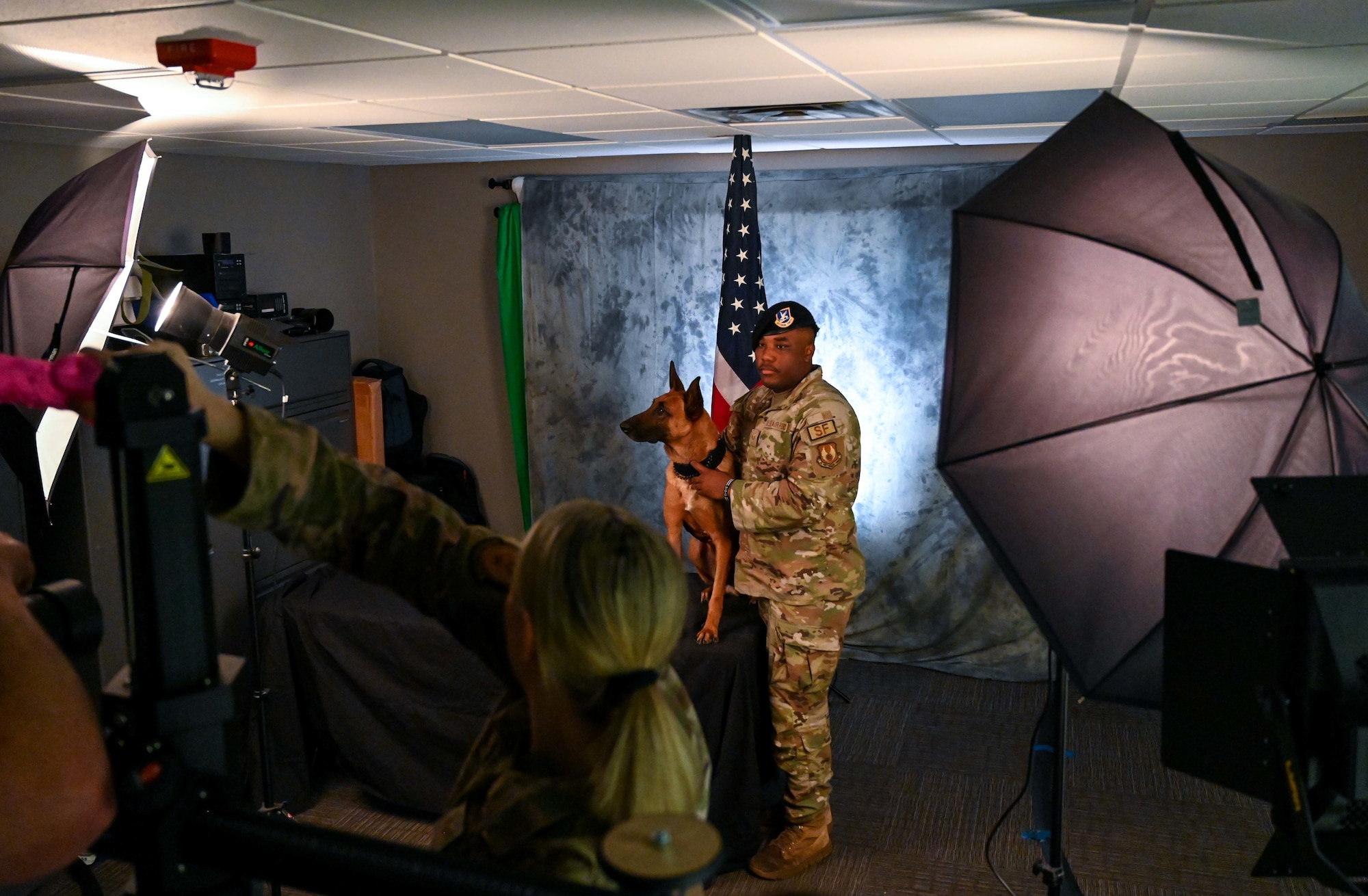 Military working dogs and their handlers from the 72nd Security Forces Squadron pose for official photos November 4, 2022, Tinker Air Force Base, Oklahoma.