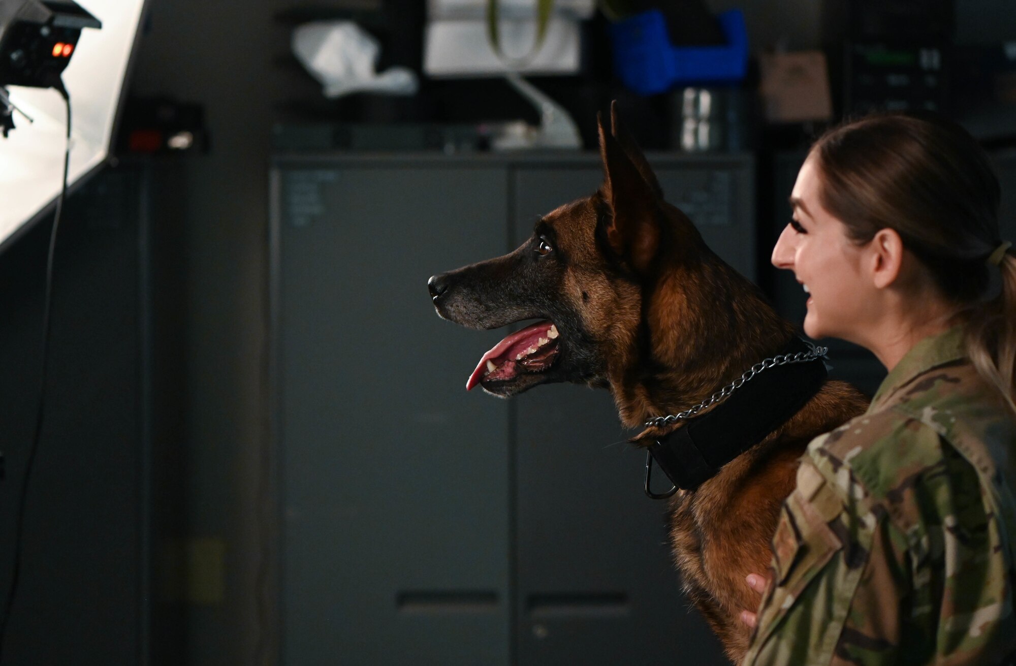 Military working dogs and their handlers from the 72nd Security Forces Squadron pose for official photos November 4, 2022, Tinker Air Force Base, Oklahoma.