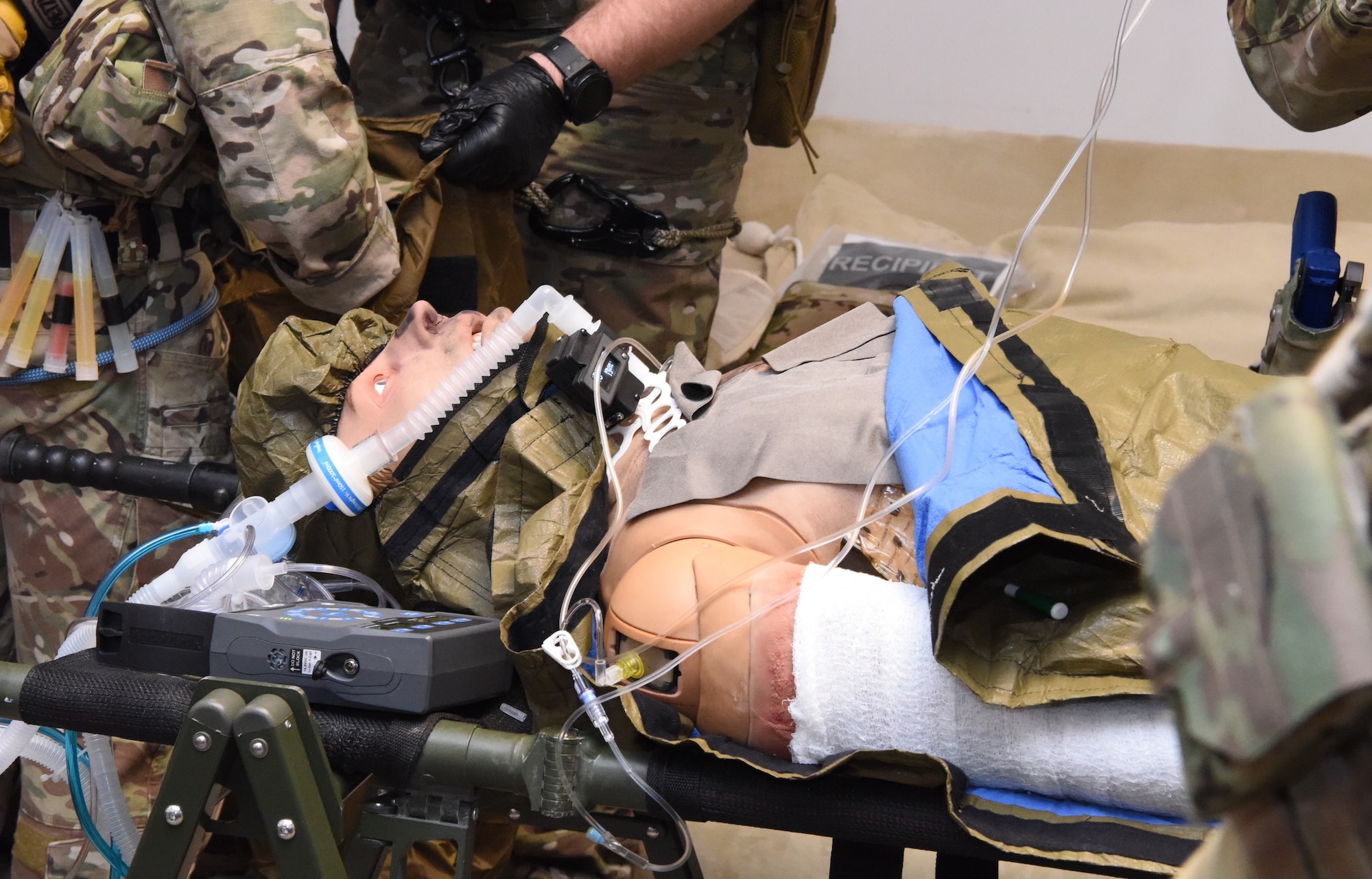 Mannequin receives tactical care from U.S. Air Force Pararescuemen.