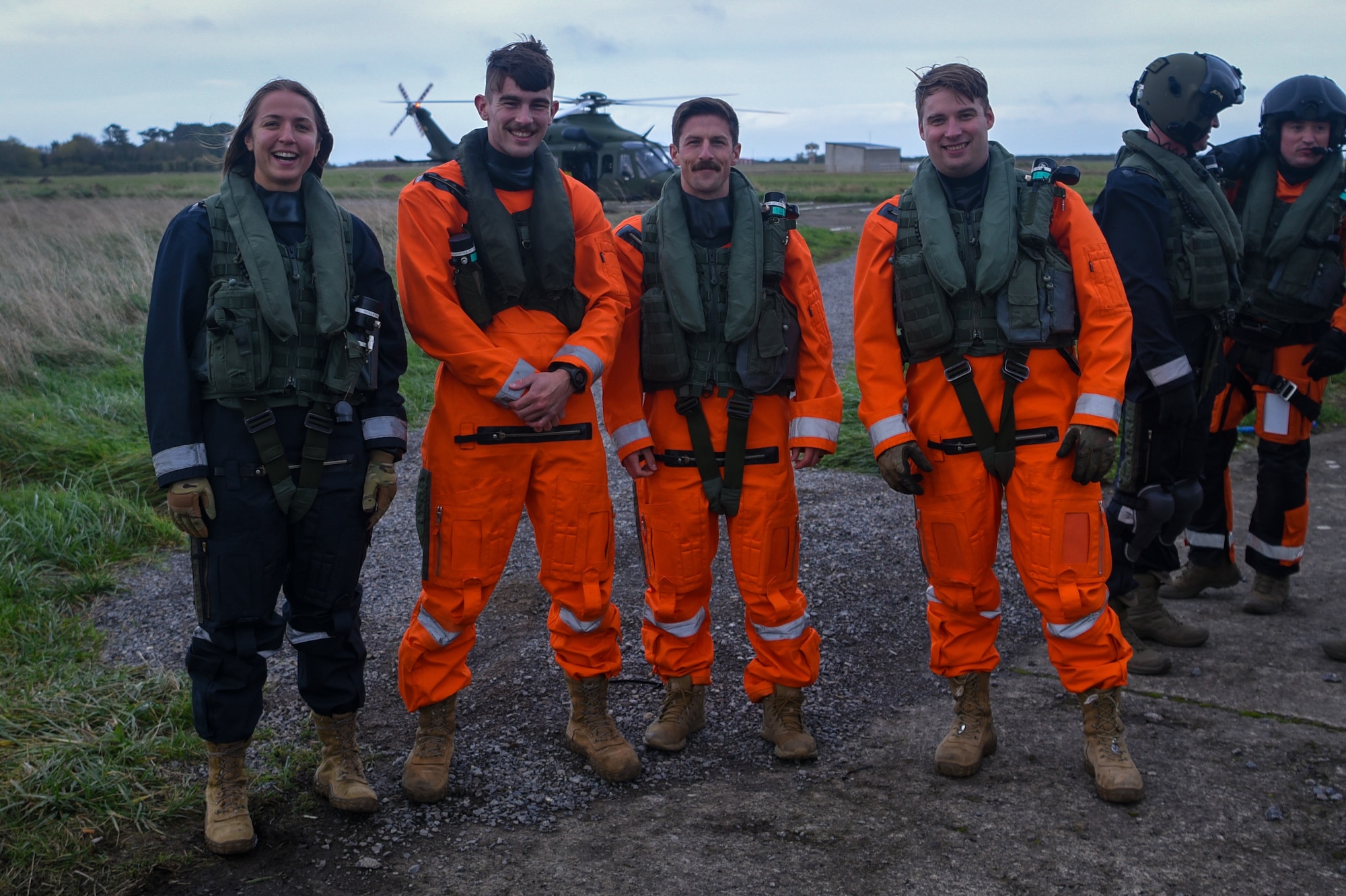 U.S. aircrew pose in front of AW139