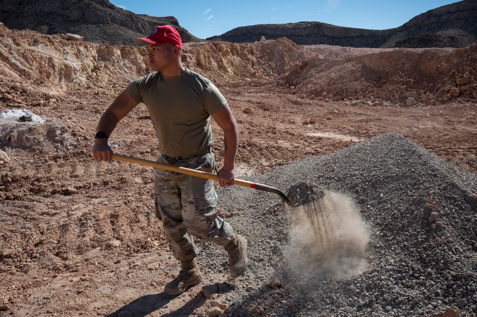 Man shovels rocks