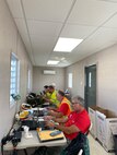 Power Team members at the Generator Staging Base (GSB) in Ponce.