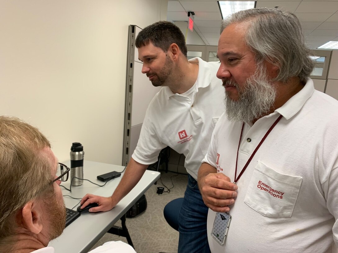 From Left to right, Action officers Troy Gilbert, Asher Alexander (Savannah District) and Kevin Kuhar at the Initial Operating Facility.