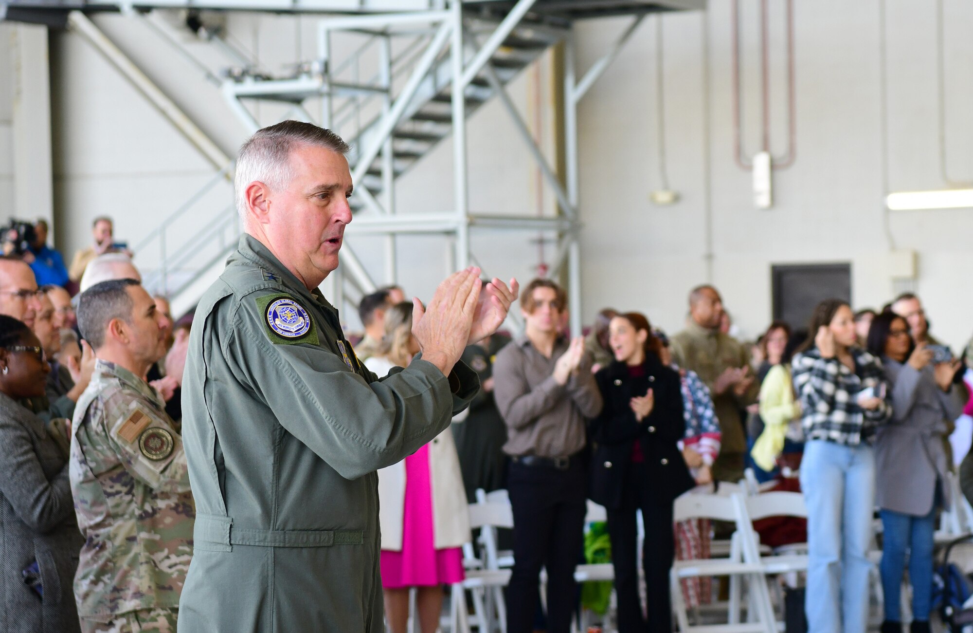 Gen. Mike Minihan speaks to DFC recipients.