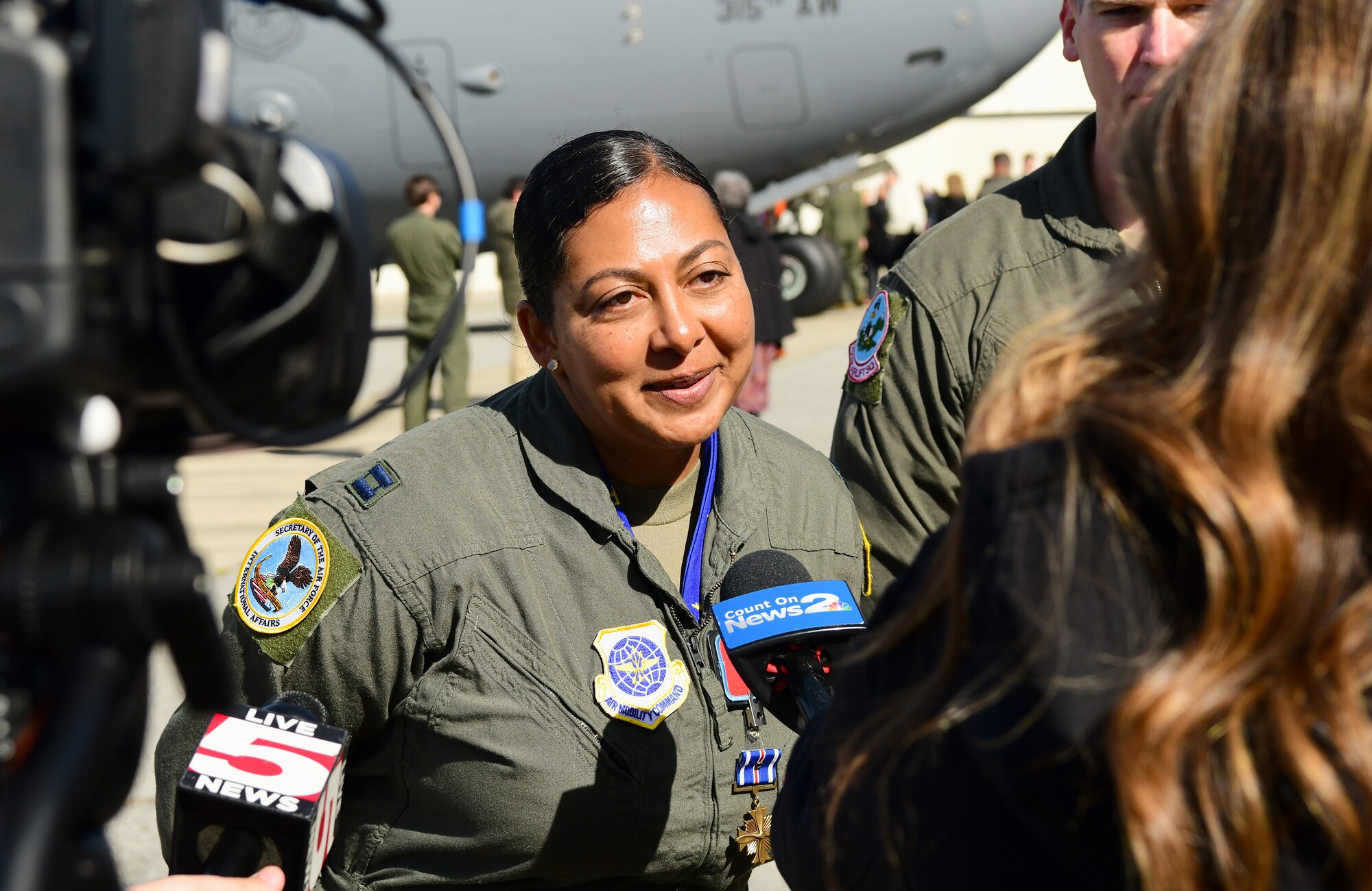 Airman is interviewed by media.