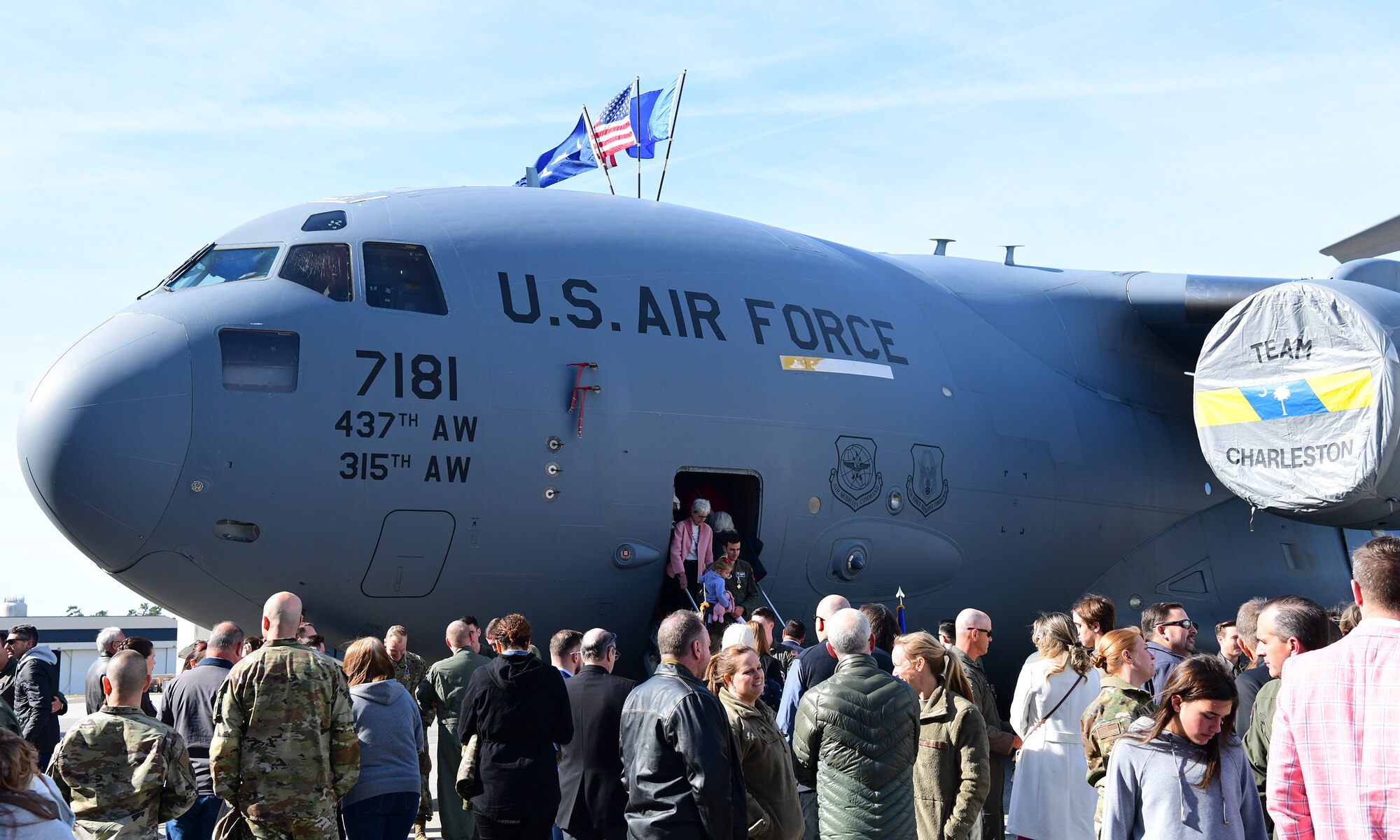 People view a C-17 aircraft.