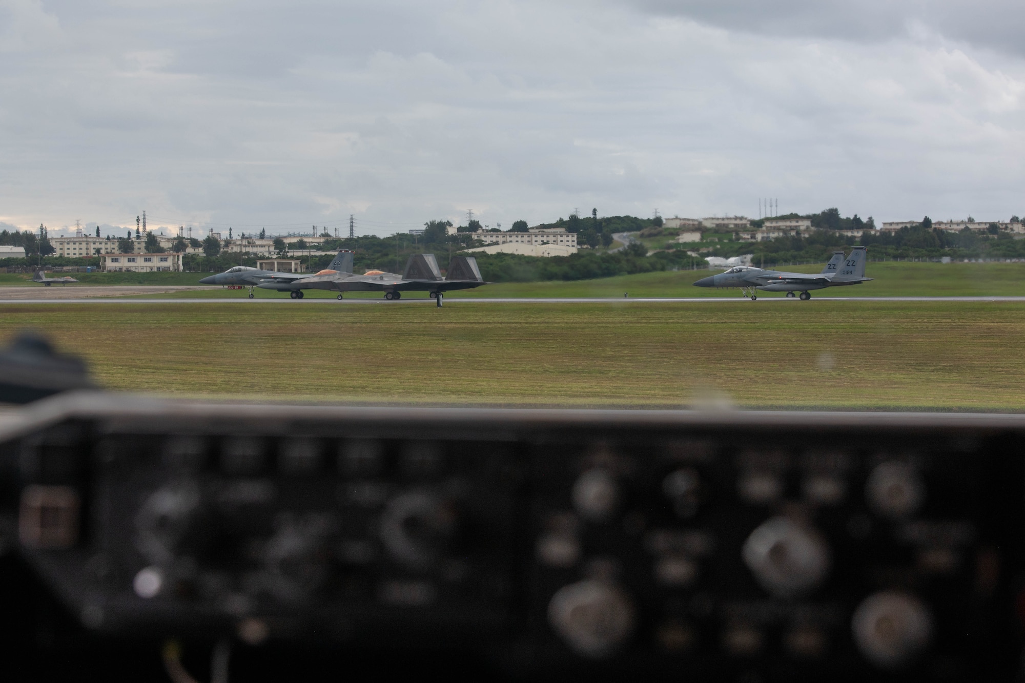 Jets taxi on the runway.