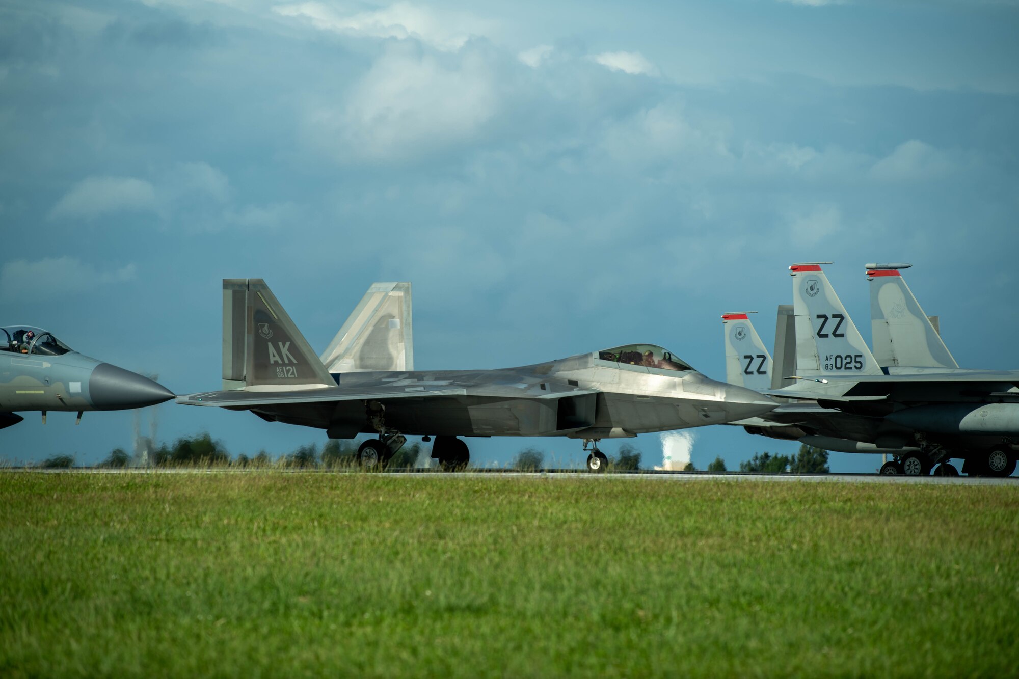 Jet taxis on runway.