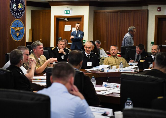 Vice Adm. Thomas E. Ishee, center left, commander of U.S. Sixth Fleet, speaks to attendees of the Combined Force Maritime Component Commander (CFMCC) flag course, hosted by the U.S. Naval War College, onboard Naval Support Activity Naples, Nov. 14, 2022. The CFMCC course, facilitated by U.S. Naval Forces Europe-Africa (NAVEUR-NAVAF), is designed to improve the effectiveness of senior leaders who will likely work together in a multinational environment. NAVEUR-NAVAF, headquartered in Naples, Italy, conducts the full spectrum of joint and naval operations, often in concert with allied and interagency partners, in order to advance U.S. national interests, security and stability in Europe and Africa.