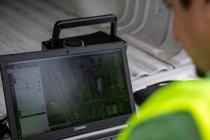 Men working with drones