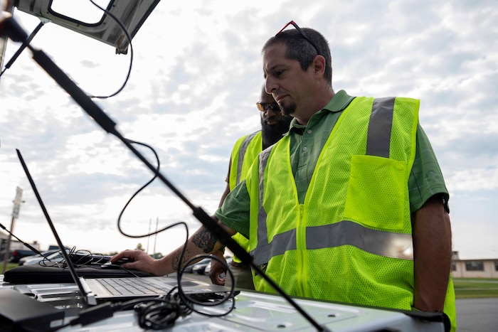 Men working with drones