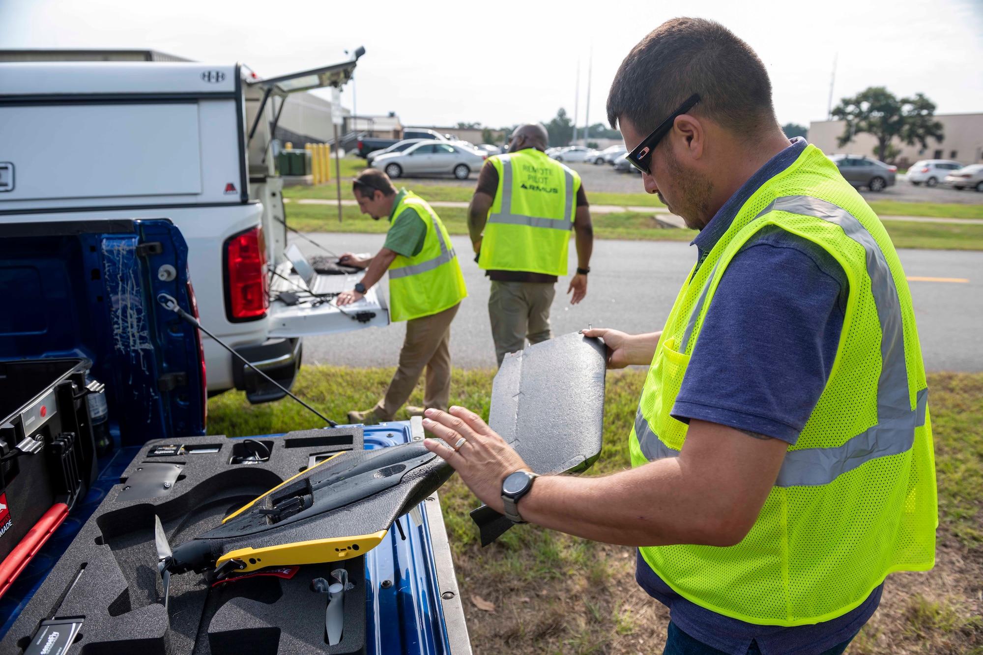 Men working with drones