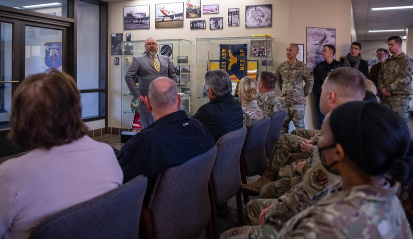 Ryan Collins, 633d Air Base Wing historian, describes the importance of preserving and learning from history and honoring those who served during the opening ceremony of the Heritage Hall at Joint Base Langley-Eustis, Virginia, Nov. 18, 2022.