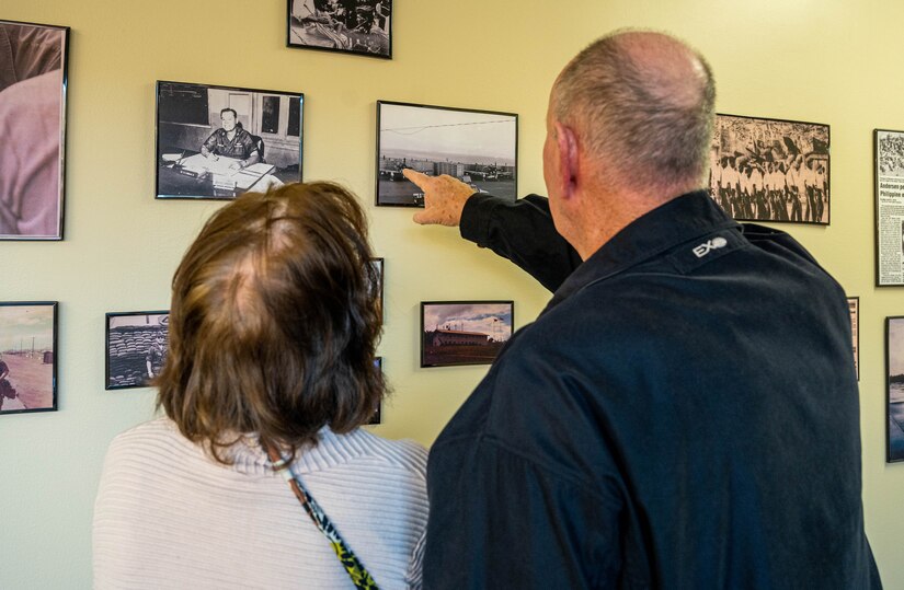 U.S. Air Force Senior Master Sgt. (retired) Robin Stewart (right) points and describes how the pictured plane functioned to his wife, Louise, at Joint Base Langley-Eustis, Virginia, Nov. 18, 2022.