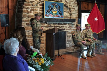 Outgoing Fort Indiantown Gap National Guard Training Center commander Lt. Col. Andrew O’Connor speaks to Soldiers and guests Nov. 19 at the change of command ceremony marking the transition of command to Lt. Col. Kevin Potts. Fort Indiantown Gap, headquarters of the Pennsylvania National Guard, is the only live-fire, maneuver military training facility in Pennsylvania and is among the busiest National Guard Training Centers in the country. (U.S. Army National Guard photo by Sgt. 1st Class Zane Craig)