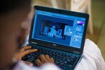 Person using editing software on laptop. (Photo by Thanzi Thanzeer on Unsplash.com)