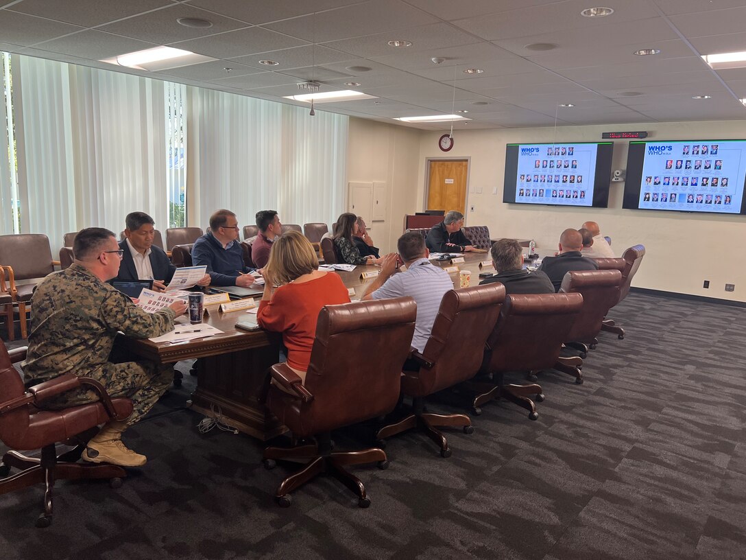 Members from the Naval Postgraduate School located in Monterey, California, are briefed by DLA Distribution San Joaquin, California leadership.