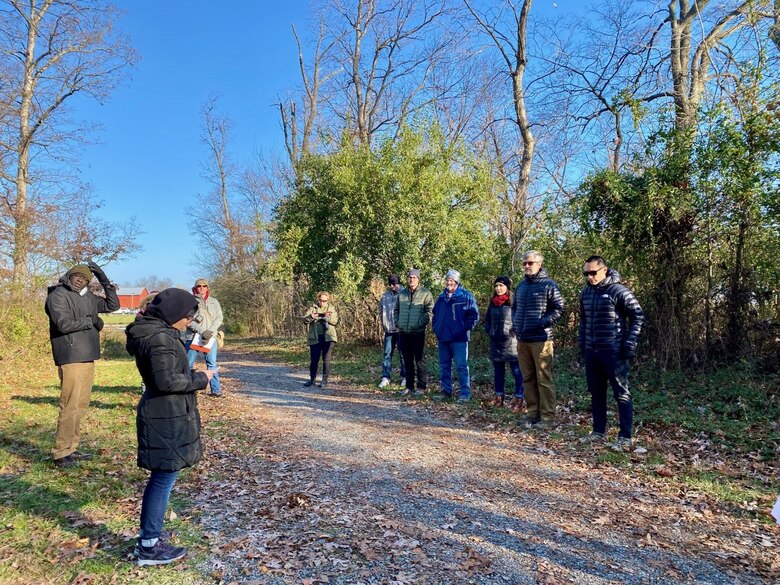 U.S. Army Corps of Engineers Transatlantic Middle East District Architect and leadership development program participant Lymarie Torres Rodriguez briefs district leaders during a “staff ride” at the 3rd Battle of Winchester battlefield during a leadership development course capstone exercise. Staff rides are a military tradition where  a senior leader, like the unit commander, takes subordinates on a battlefield tour to discuss what types of leadership lessons can be learned from a given battle.