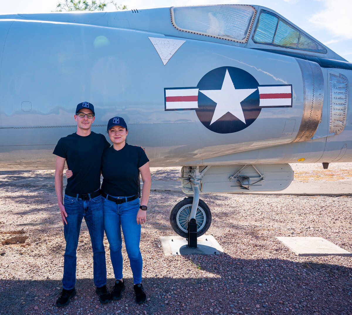 Trainees Melissa McCabe and Alex Waters pose for a photo at the Morris Air National Guard Base heritage park before leaving for Basic Miliary Training together. (U.S. Air National Guard photo by Staff Sgt. Van Whatcott)