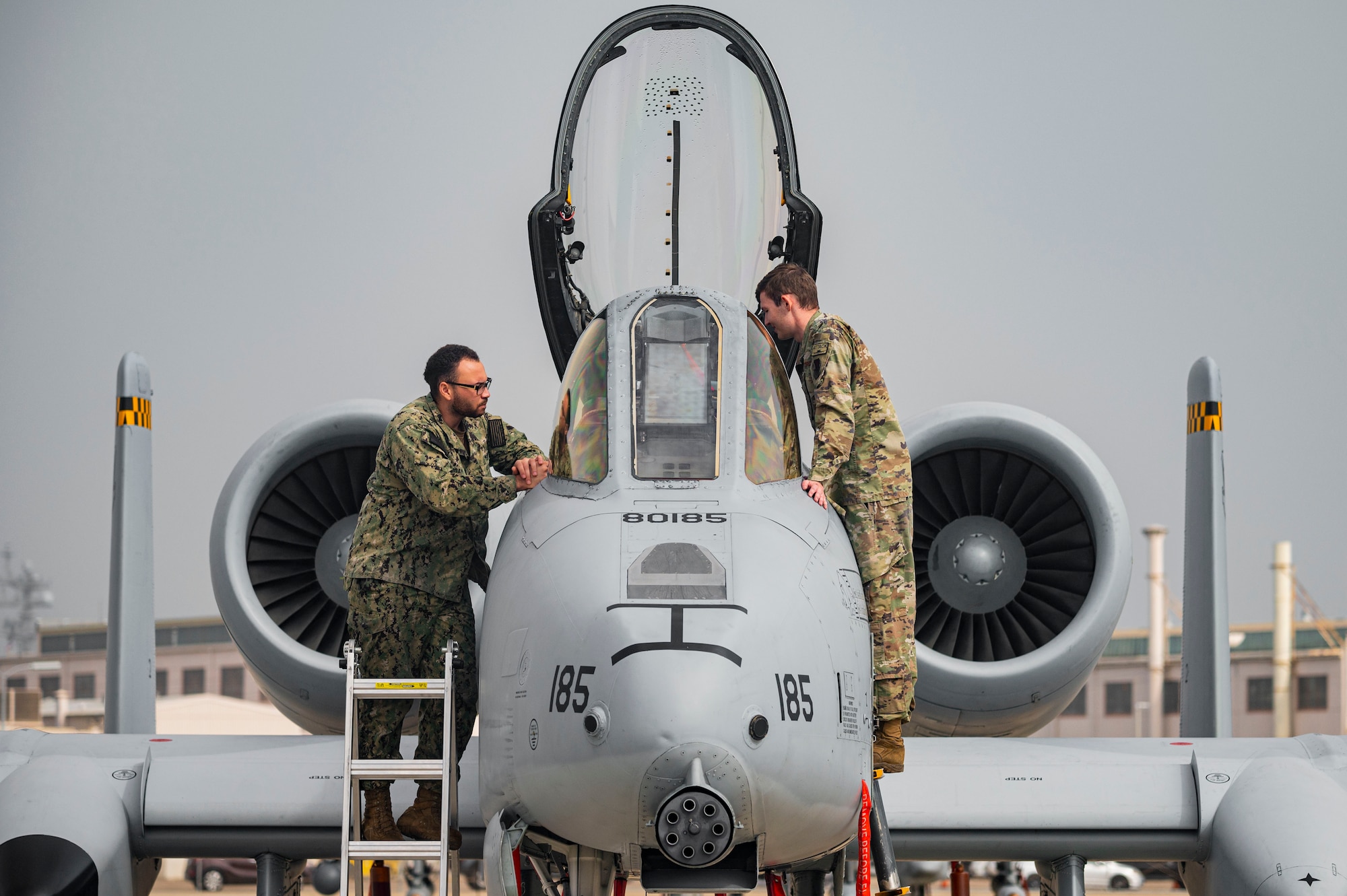 Airman and Seaman discuss A-10 capabilities.