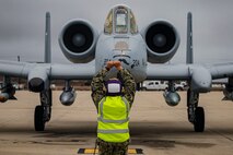 Navy seaman taxis in A-10.
