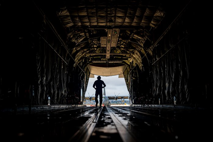 Airman walks out of plane.
