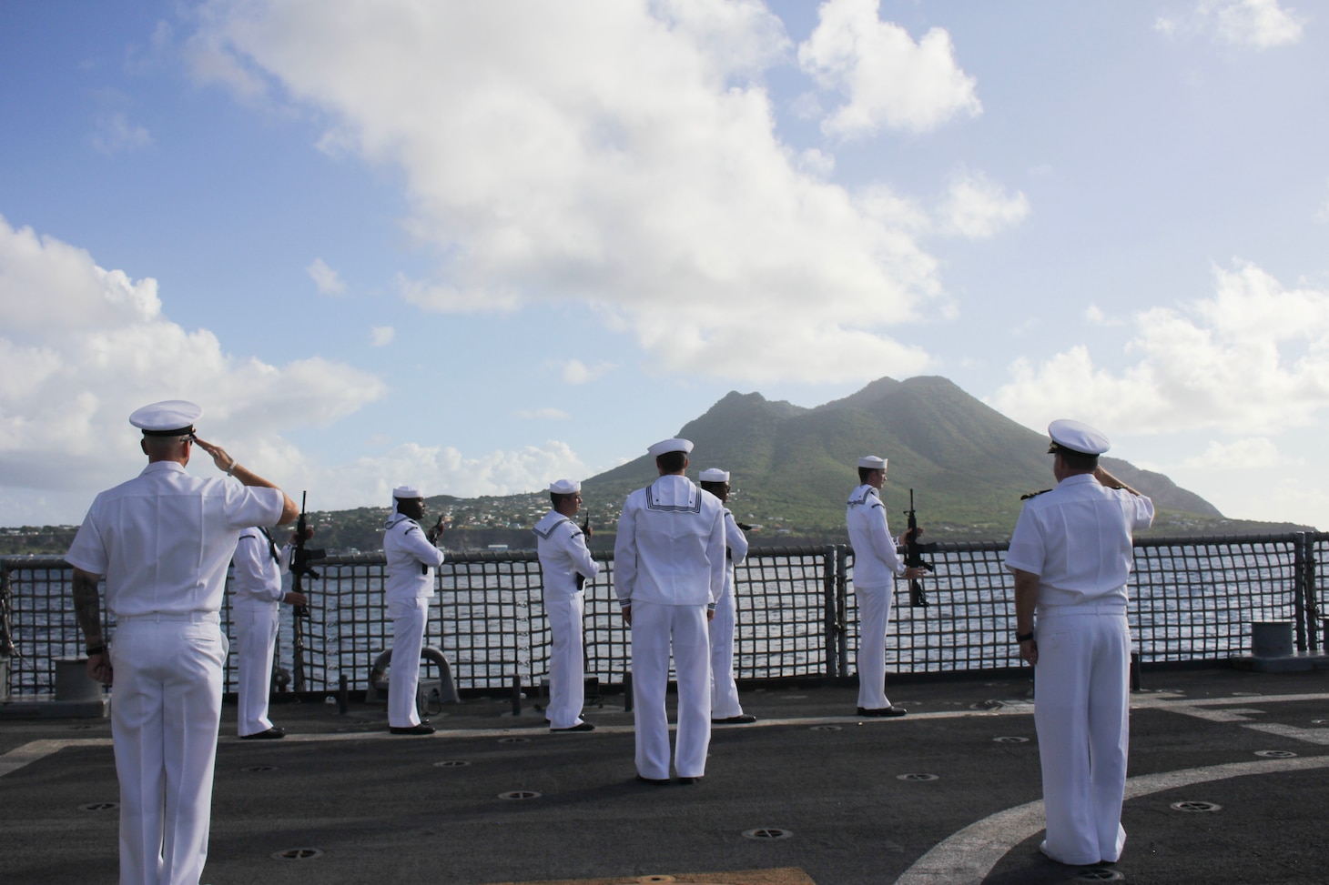 Sailors assigned to the Freedom-variant littoral combat ship USS Milwaukee (LCS 5) conduct a gun-salute for Statia Day off the coast of Sint Eustatius, Netherlands, Nov. 16, 2022. Statia Day is a national holiday celebrated on the Caribbean island of Sint Eustatius. It celebrates the “first salute” when Sint Eustatius, locally known as Statia, became the first country to recognize the United States as a nation 245 years ago when after the U.S. declared independence, a Continental Navy ship fired a gun salute upon entering the harbor, and the island, by order of the Dutch governor, returned the salute. Milwaukee is deployed to the U.S. 4th Fleet area of operations to support Joint Interagency Task Force South’s mission, which includes counter-illicit drug trafficking missions in the Caribbean and Eastern Pacific.