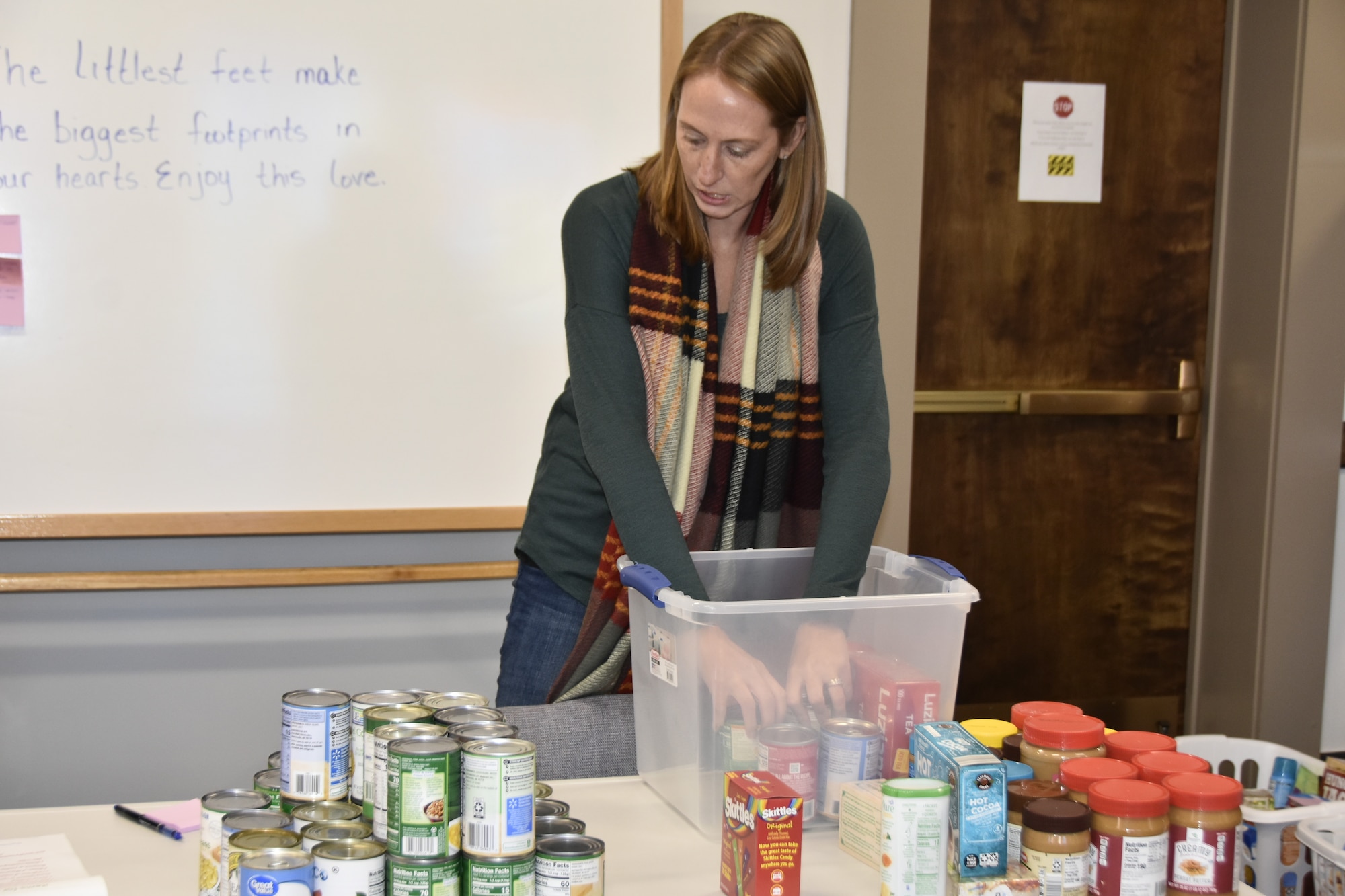 Arnold Engineering Development Complex team member Melissa Minter sorts food items in the chapel Nov. 14, 2022, at Arnold Air Force Base, Tennessee.