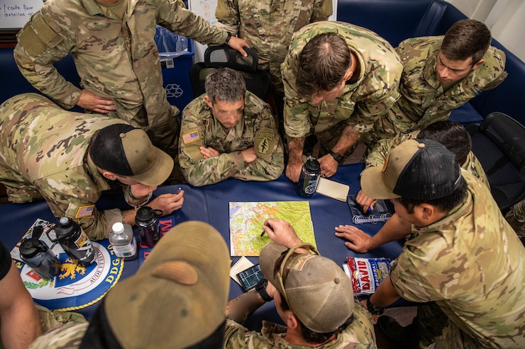 U.S. Soldiers assigned to the 2nd Battalion, 1st Special Forces Group (Airborne) prepare for JPMRC 23- 01 aboard the Guided-Missel Destroyer USS Hopper (DDG 70) near Oahu, Hawaii, Oct. 25, 2022. U.S.S. Hopper and crew are participating in Joint Pacific Multinational Readiness Center (JPMRC) rotation 23-01, alongside the 25th Infantry Division, and elements from the 1st Special Forces Group (Airborne). JPMRC rotations allow Army forces to rehearse strategic movements and maneuvers, integrate with allies and partners, and increase the readiness of the Joint Force in the Indo-Pacific region. (U.S. Army photo by Staff Sgt. Miguel Peña)