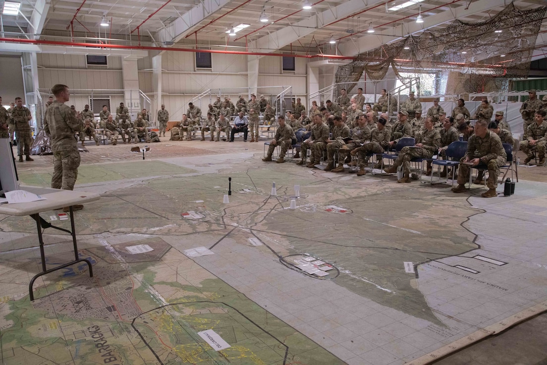 U.S. Army Soldiers with 2nd Infantry Brigade Combat Team, 25th Infantry Division, receive a sustainment brief during brigade rehearsals on Wheeler Army Airfield, HI, Oct. 29, 2022. The Joint Pacific Multinational Readiness Center (JPMRC) training strongly contributes to our readiness in the most consequential region in the world at the most consequential times in history during rotation 23-01. JPMRC strengthens defense relationships, fosters multinational interoperability, increases readiness, and reinforces the unified regional land power network of the Joint Force. (U.S. Army photos by Spc. Jeffrey Garland)