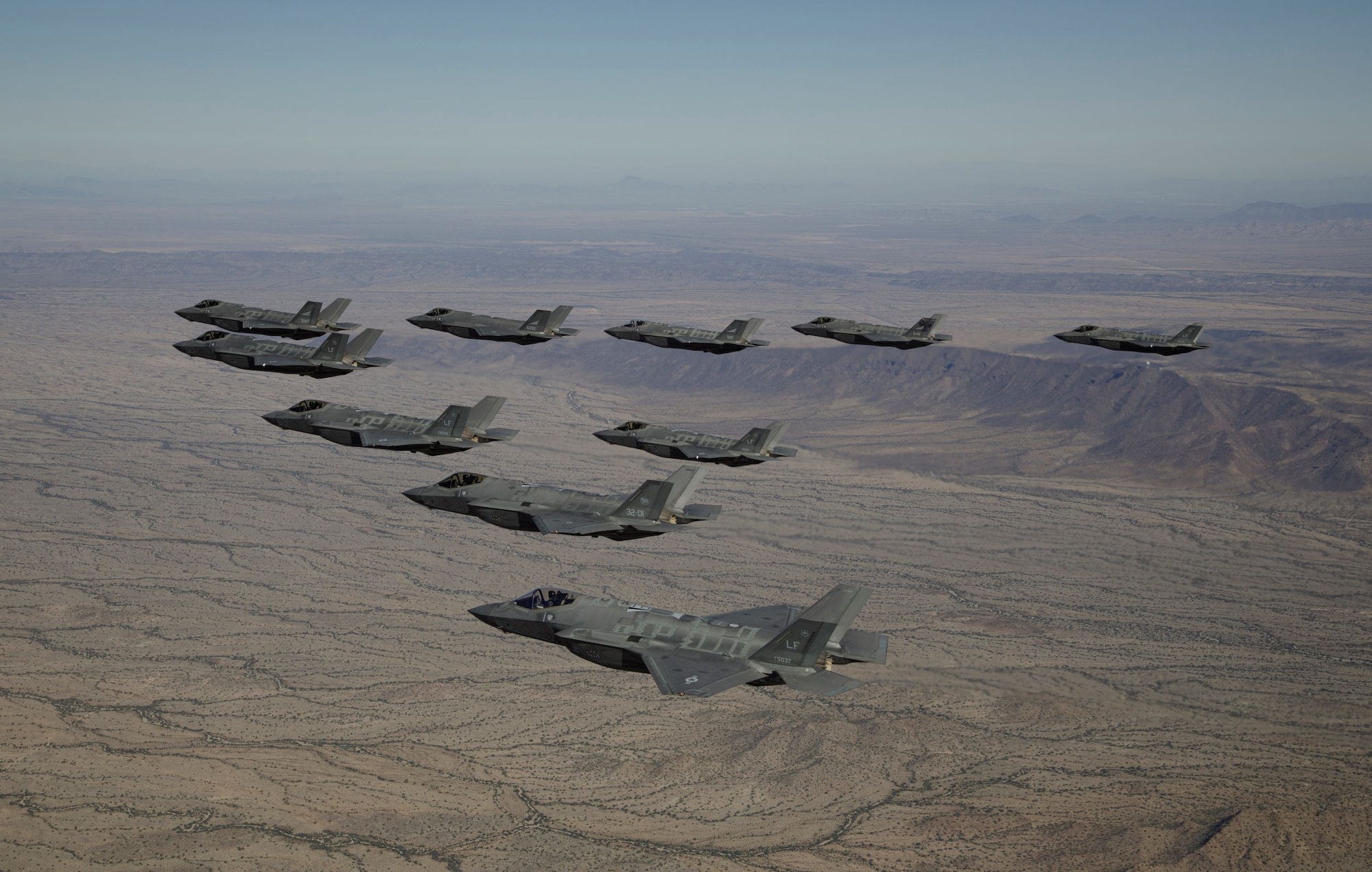 Ten F-35 Lightning II aircraft assigned to the 56th Fighter Wing fly in formation