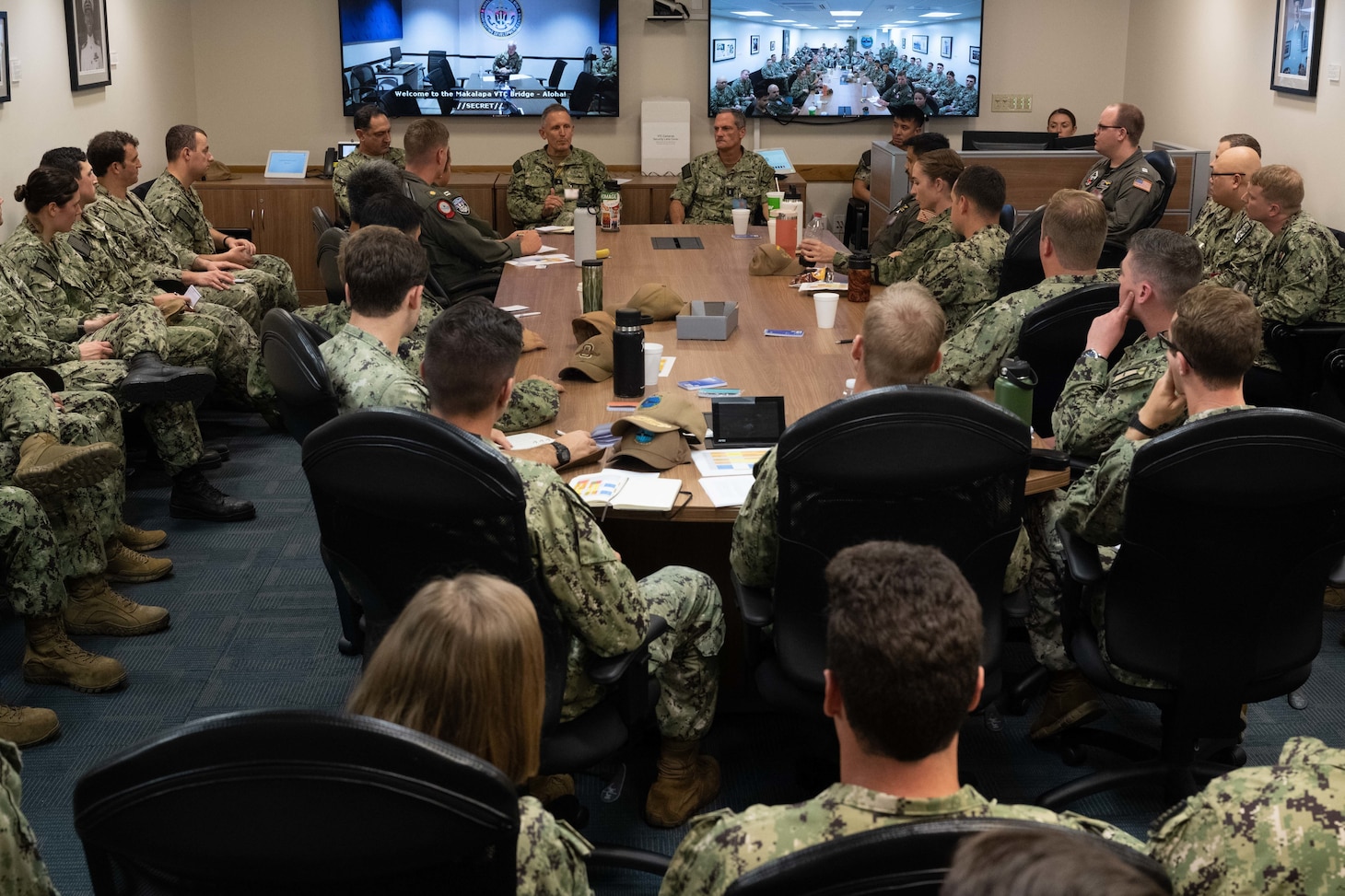 PEARL HARBOR (November 17, 2022) — Rear Adm. Michael Vernazza, Commander, Fleet Information Warfare Command/Information Warfare Task Force Pacific, addresses a group of junior officers at a flag officer panel held during the inaugural Commander, Submarine Force U.S. Pacific Fleet Junior Officer Undersea Symposium and Training (JOUST) event, Nov. 17, 2022. Pacific JOUST is an all-community event, planned and executed by junior officers to develop the U.S. Navy's future undersea warfare leaders. (Badges blurred for security purposes).

(U.S. Navy photo by Mass Communication Specialist 2nd Class Molly Crawford)