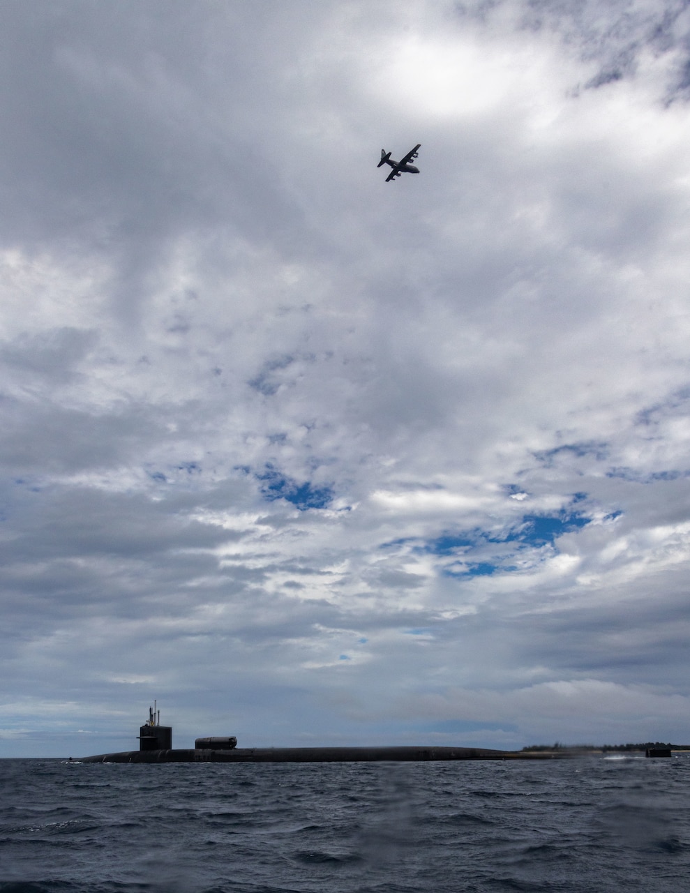 OKINAWA, Japan (Nov. 10, 2022) The Ohio-class guided-missile submarine USS Michigan (SSGN 727) made a brief stop for personnel (BSP) near Okinawa, Japan as part of its deployment to the U.S. 7th Fleet area of operations, Nov. 10. Michigan is homeported at Naval Base Kitsap, Washington and is operating in the U.S. 7th Fleet area of operations, conducting maritime security operations and supporting national security interests. (U.S. Marine Corps photo by Staff Sgt. Andrew Ochoa)