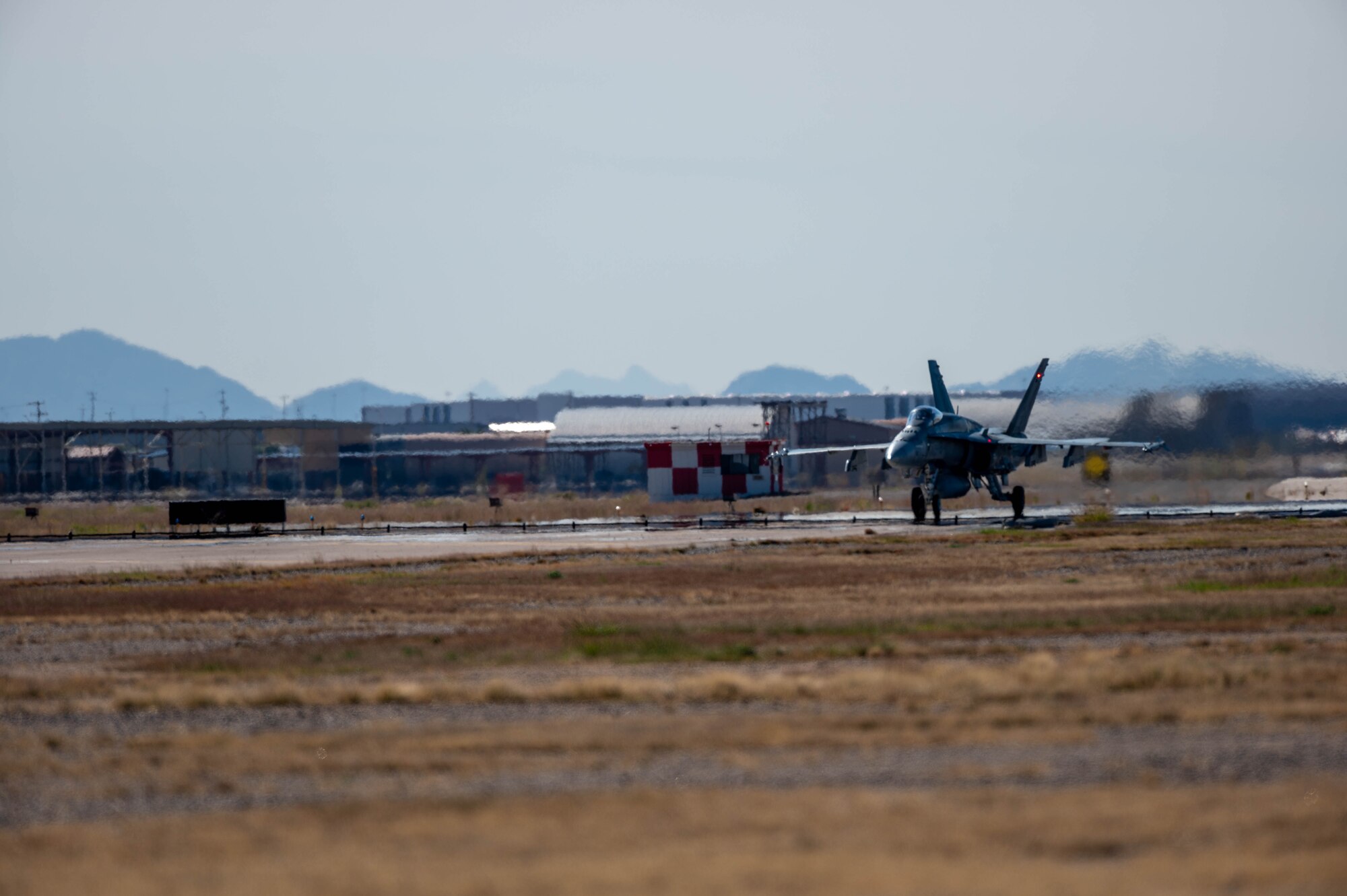 A Royal Canadian Air Force  CF-18 Hornet aircraft from the 401 Tactical Fighter Squadron taxis after landing Nov. 17, 2022, at Luke Air Force Base, Arizona.