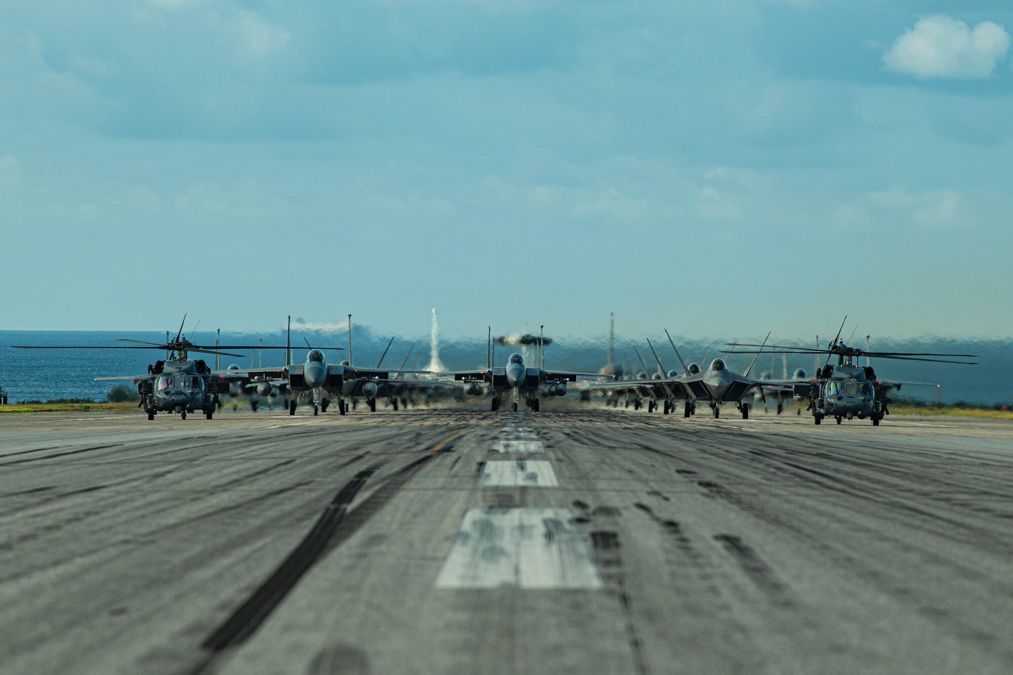 Aircraft form up on runway.