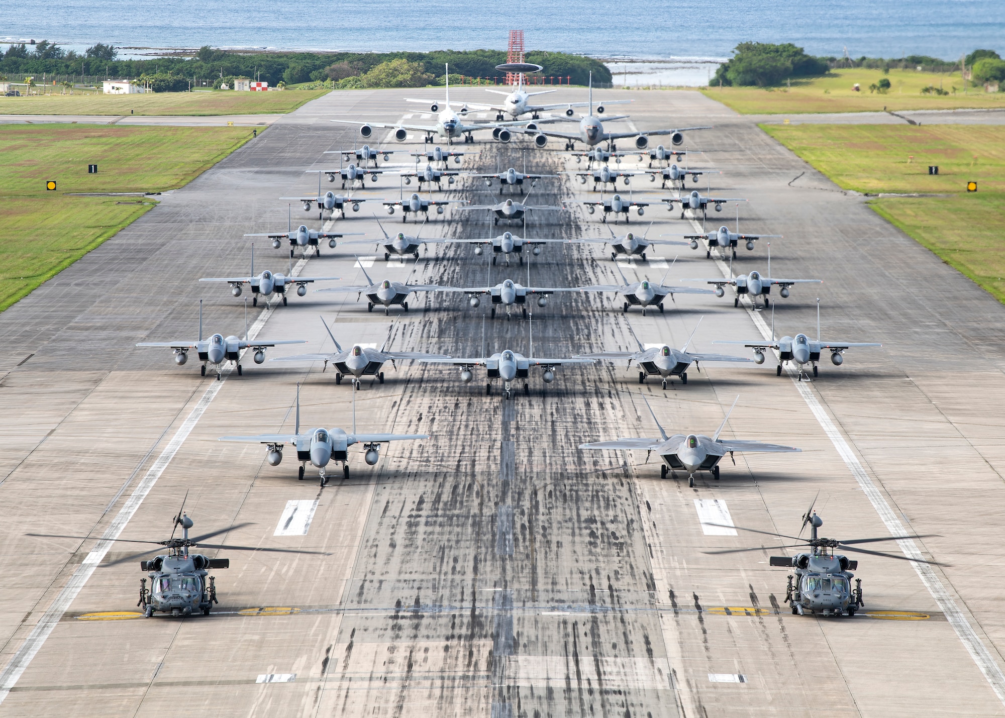 U.S. Air Force aircraft line up on the runway during a capabilities demonstration at Kadena Air Base, Japan, Nov. 22, 2022. Similar training is routinely conducted at U.S. Air Force bases across Japan and around the globe to ensure Airmen’s readiness to respond to a range of potential contingencies. (U.S. Air Force photo by Senior Airman Jessi Roth)
