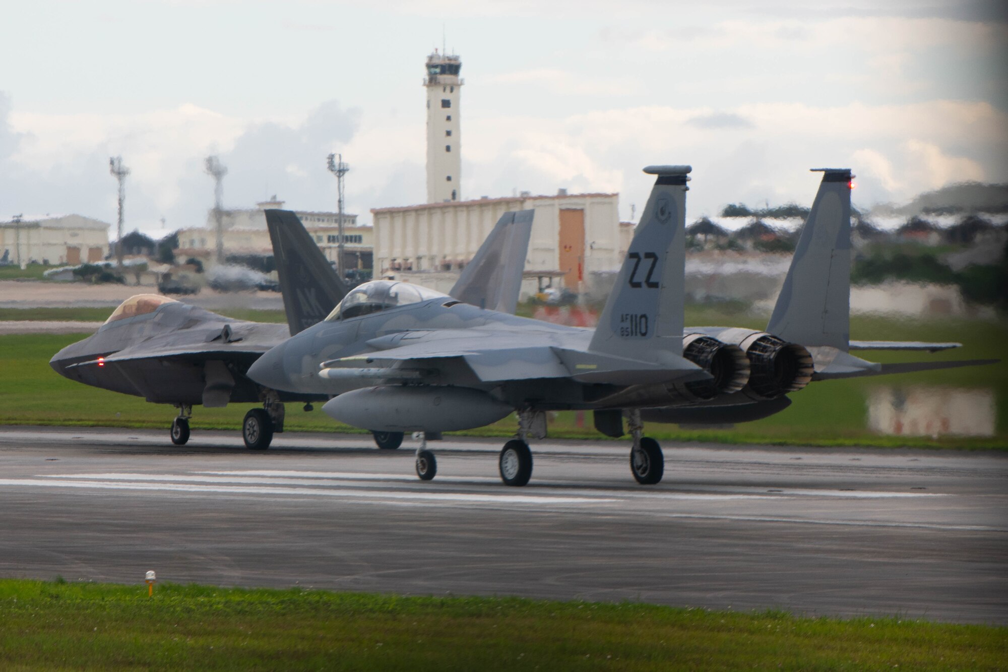 Jets taxi on the runway.