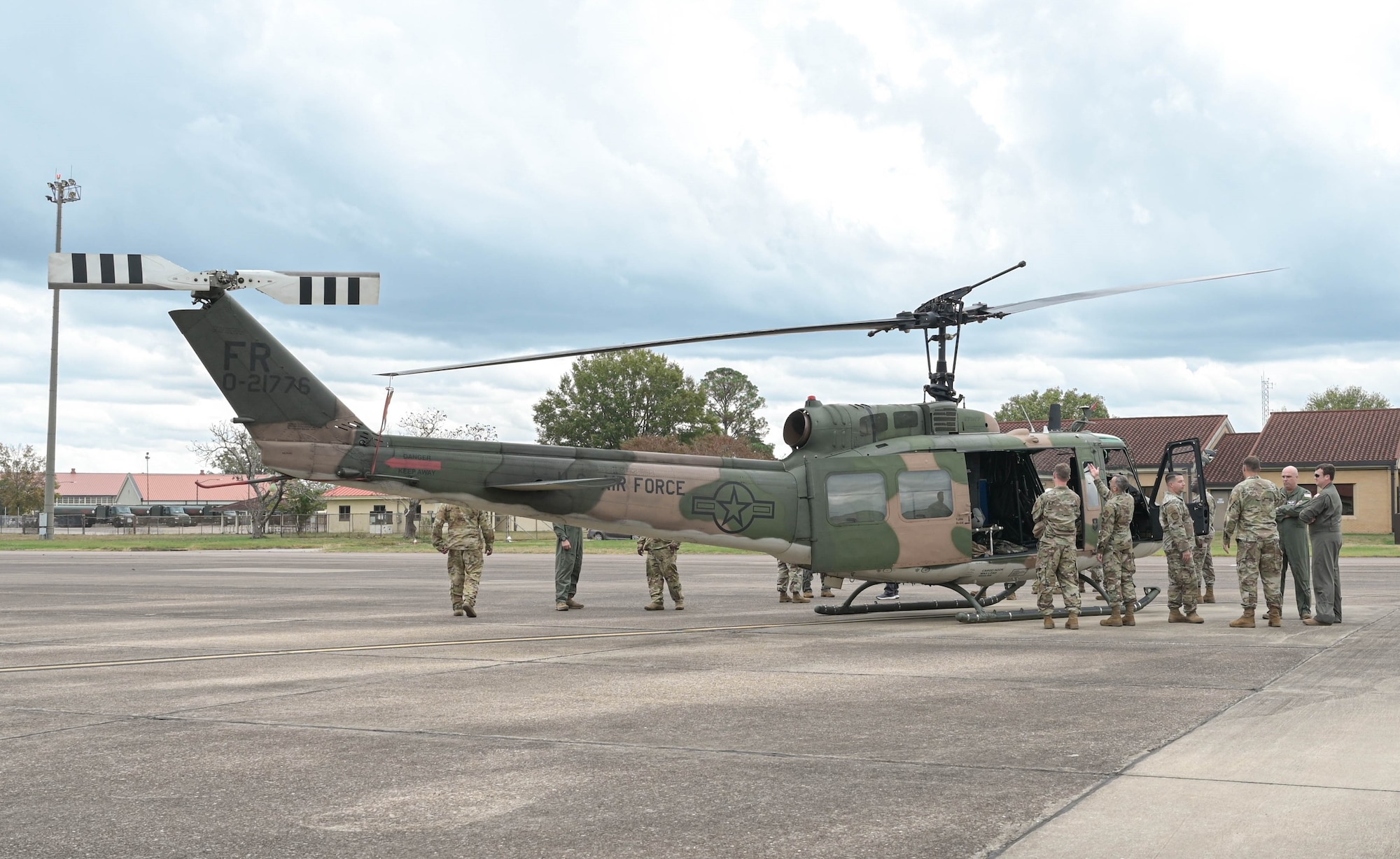 people observing a helicopter