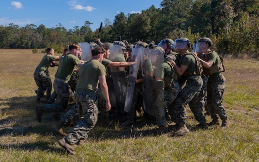 Marines with 26th MEU’s Battalion Landing Team 1st Battalion, 6th Marine Regiment participates in non-lethal weapons training on Camp Lejeune, North Carolina, Nov. 4, 2022. During the training, Marines used non-lethal weapons and riot shields to perform crowd control, dispersion, and built confidence in de-escalating potential threats.