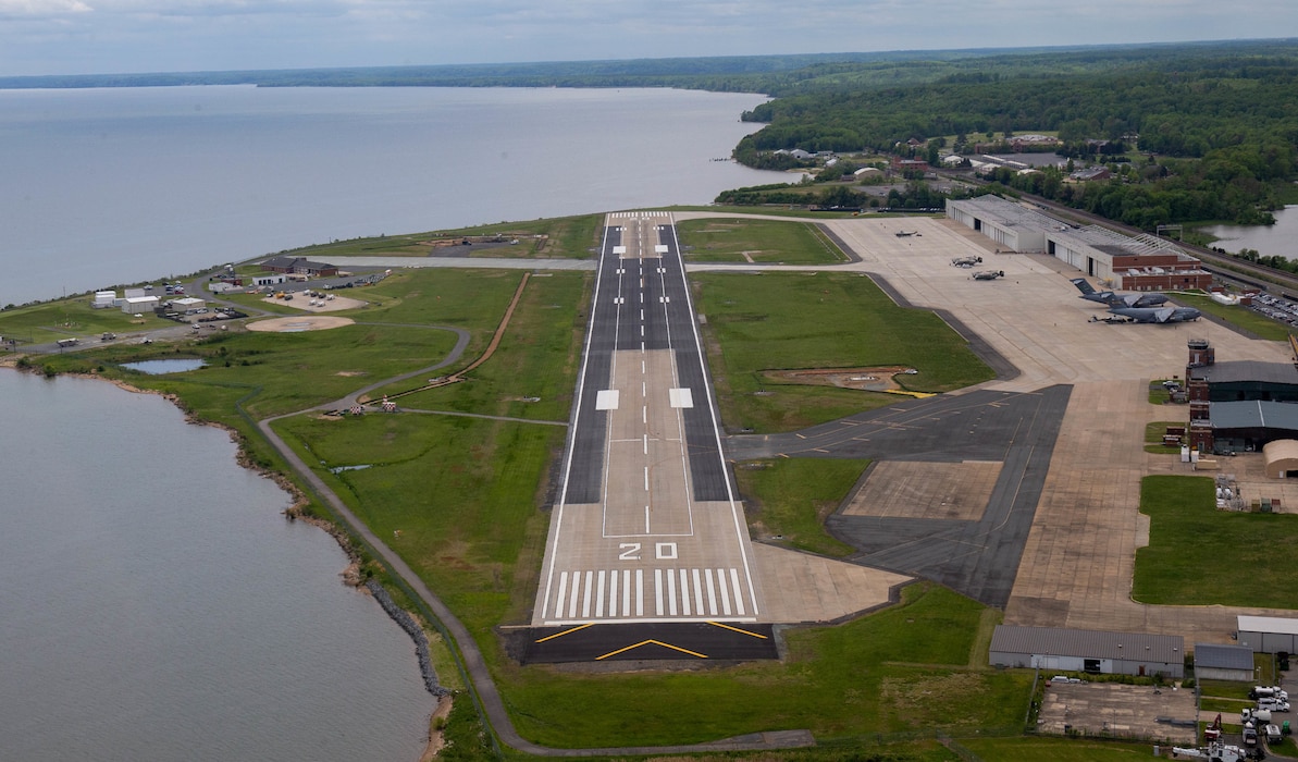 An aerial view of the renovated runway at Marine Corps Air Facility (MCAF), Marine Corps Base Quantico, Virginia, May 5, 2022. The large-scale runway repair project replaced old materials that either expired or were deemed outdated for use, with new and current materials. The updates to the runway included
concrete slab repairs and section replacements, asphalt repaving, and updated signage. The mission of MCAF is to operate and maintain the air facilities and provide services and material support to Marine Helicopter Squadron One and other transient aircraft. (U.S. Marine Corps photo by Cpl. Mitchell Johnson)