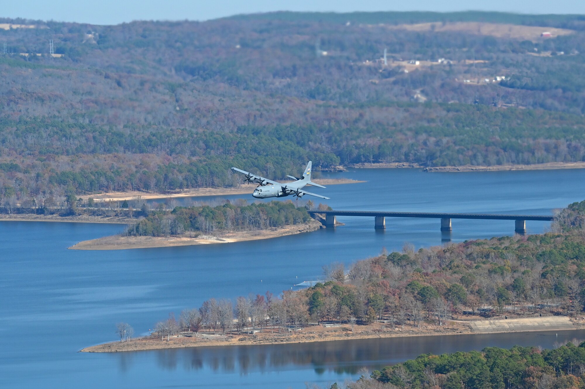 A c-130J flies in the sky over Arkansas
