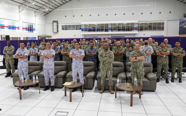 221121-N-FO714-1138 KUANTAN, Malaysia (Nov. 21, 2022) Leaders from the U.S. and Malaysian Armed Forces pose for a photo during the opening ceremony for exercise Cooperation Afloat Readiness and Training (CARAT) Malaysia, Nov. 21. CARAT Malaysia 2022 highlights the 28th anniversary of CARAT among Allies and partners as a way to demonstrate long-term commitment to strengthened relationships throughout South and Southeast Asia and to highlight U.S. Navy commitment to key Association of Southeast Asian Nations (ASEAN) partners to reinforce ASEAN Centrality. Exercises like this one reassure our Allies and partners of the U.S. commitment to maintaining a free and open Indo-Pacific. (U.S. Navy photo by Mass Communication Specialist 1st Class Deanna C. Gonzales)