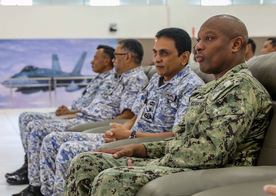 221121-N-FO714-1076 KUANTAN, Malaysia (Nov. 21, 2022) Capt. Walter Mainor, commander, Task Force 71 and Royal Malaysian Navy First Adm. Baharudin bin Wan Md Nor, deputy assistant chief of staff for the Malaysian Armed Forces Joint Force Headquarters Joint Operation Division listen to remarks during the opening ceremony for exercise Cooperation Afloat Readiness and Training (CARAT) Malaysia, Nov. 21. CARAT Malaysia 2022 highlights the 28th anniversary of CARAT among Allies and partners as a way to demonstrate long-term commitment to strengthened relationships throughout South and Southeast Asia and to highlight U.S. Navy commitment to key Association of Southeast Asian Nations (ASEAN) partners to reinforce ASEAN Centrality. Exercises like this one reassure our Allies and partners of the U.S. commitment to maintaining a free and open Indo-Pacific. (U.S. Navy photo by Mass Communication Specialist 1st Class Deanna C. Gonzales)