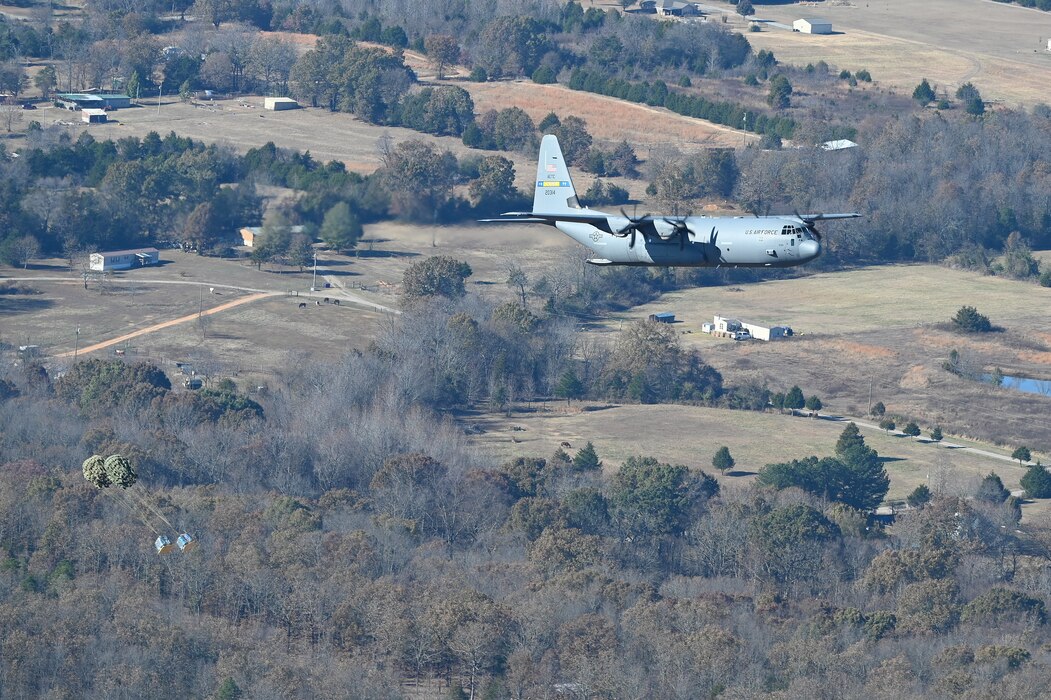 A c-130J flies in the sky over Arkansas