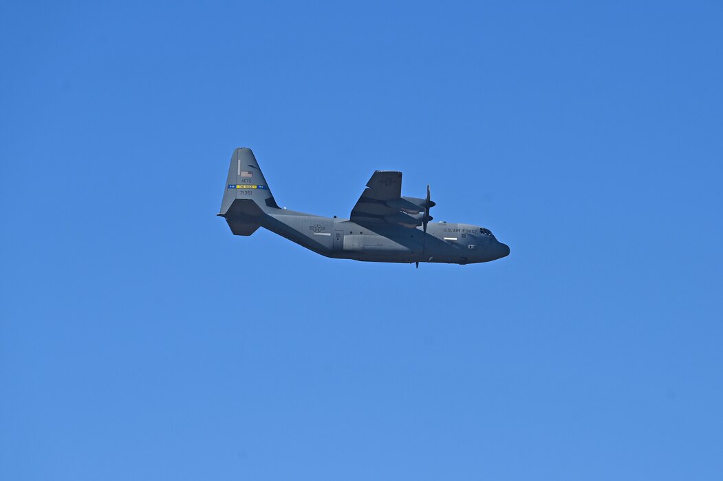 A c-130J flies in the sky over Arkansas