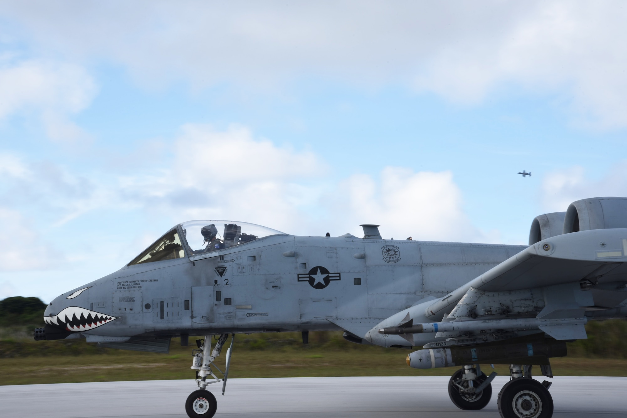 Photo of aircraft taxiing on a runway