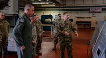 Gen. Mike Minihan listens to an Airman's initiative.