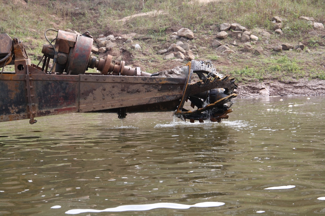 The Dubuque is a cutterhead type of dredge. It is equipped with a rotating cutting tool that loosens and extracts sediment from the navigation channel.